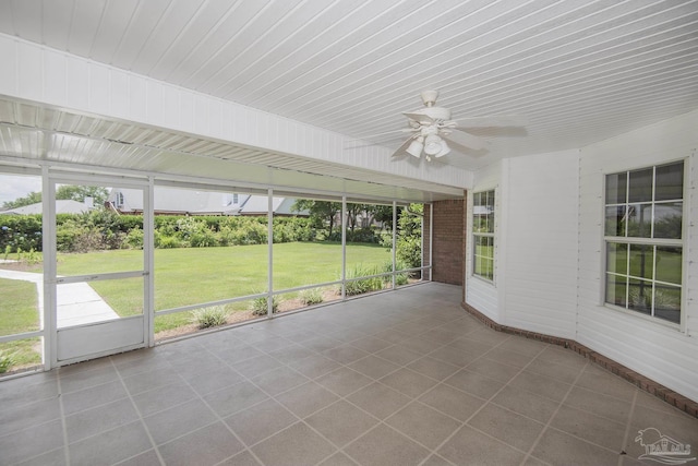 3221 Cobblestone Dr, Pace, FL 32571 - unfurnished sunroom featuring ceiling fan