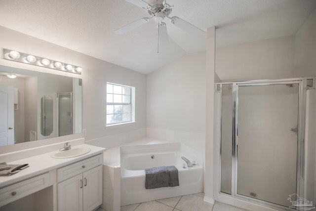 3221 Cobblestone Dr, Pace, FL 32571 - bathroom with vaulted ceiling, a shower stall, ceiling fan, a bath, and vanity
