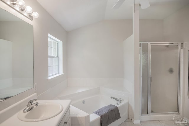 3221 Cobblestone Dr, Pace, FL 32571 - full bath featuring vanity, a shower stall, a garden tub, vaulted ceiling, and ceiling fan