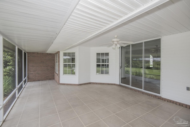 3221 Cobblestone Dr, Pace, FL 32571 - unfurnished sunroom featuring a ceiling fan