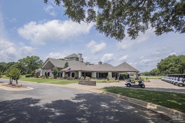 3221 Cobblestone Dr, Pace, FL 32571 - view of front of house with a front lawn