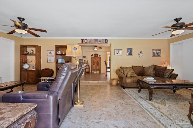 living room featuring ornamental molding and ceiling fan