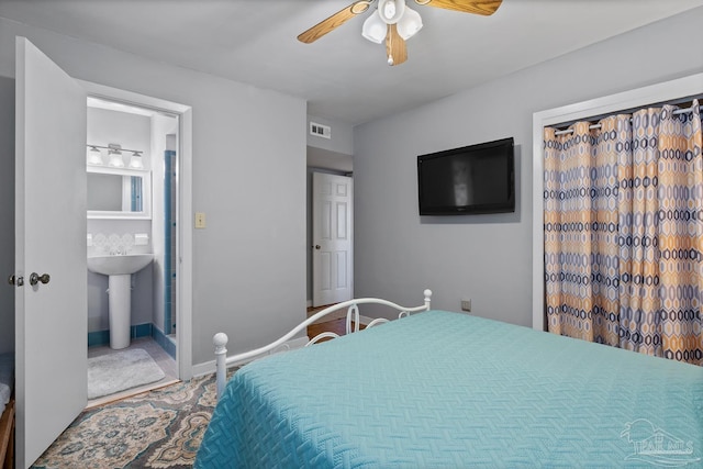 bedroom with a ceiling fan, visible vents, and baseboards