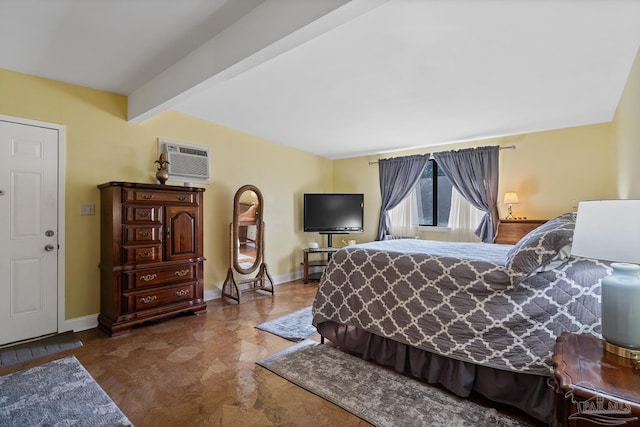 bedroom with beam ceiling, a wall unit AC, and baseboards