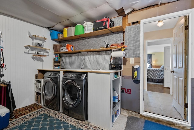 clothes washing area with laundry area and separate washer and dryer