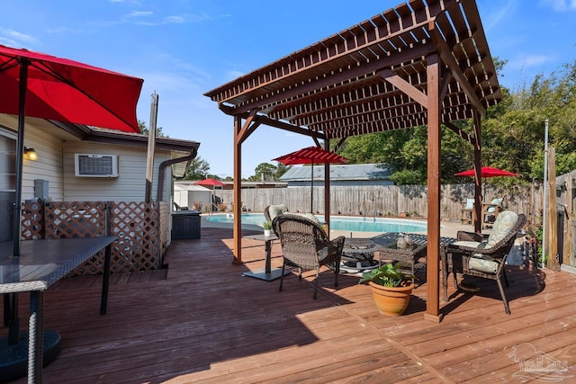 deck featuring a fenced backyard and a fenced in pool