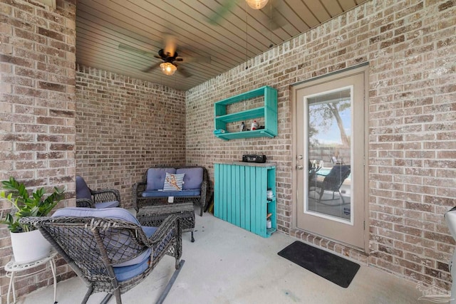 view of patio featuring ceiling fan