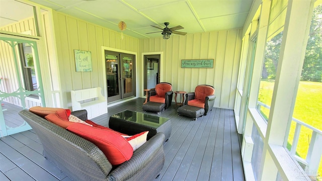 wooden deck with ceiling fan