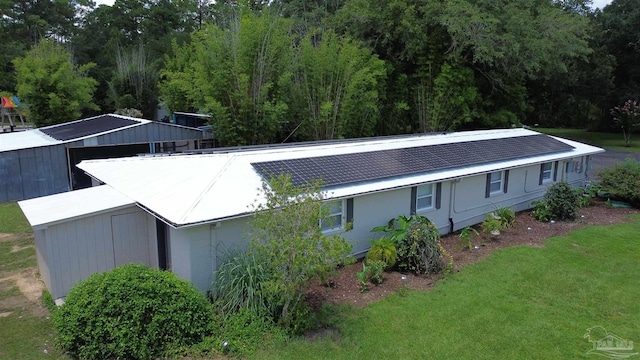 exterior space featuring a lawn