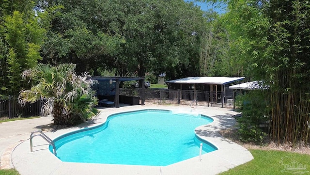 view of pool featuring a patio