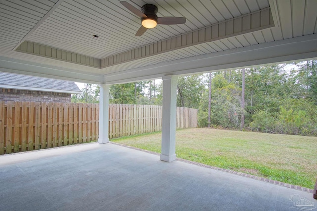 view of patio / terrace with fence and a ceiling fan