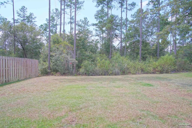 view of yard featuring fence