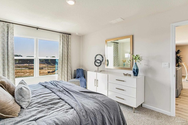 2766 Chevy Cir, Pace, FL 32571 - bedroom featuring baseboards and light colored carpet