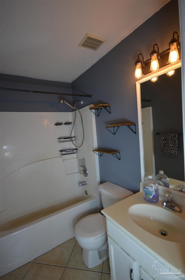 bathroom with visible vents, tile patterned flooring, vanity, toilet, and shower / tub combination