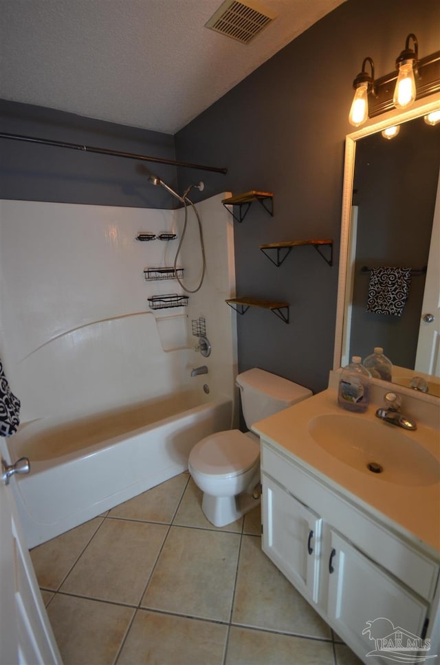 full bathroom with visible vents, tile patterned flooring, vanity, toilet, and  shower combination