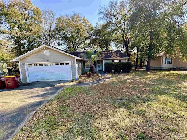 single story home featuring a garage, concrete driveway, and a front yard