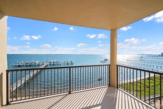 balcony featuring a water view