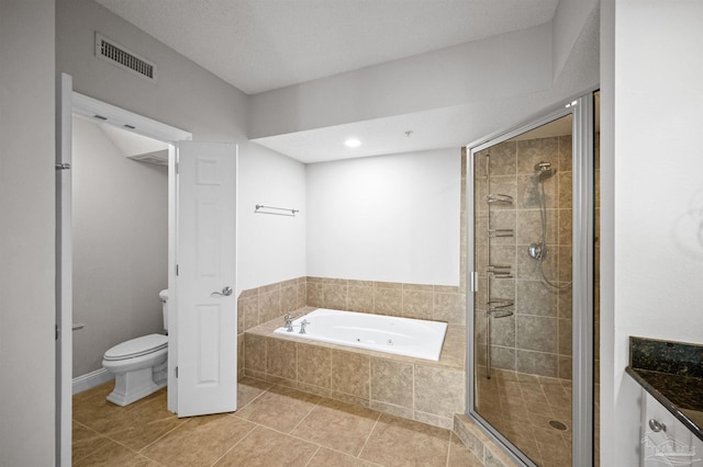 bathroom with tile patterned floors, independent shower and bath, and toilet