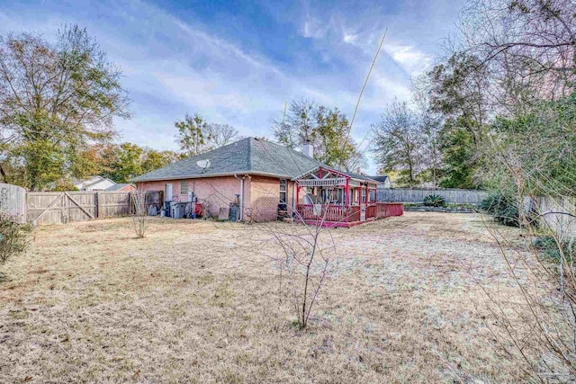 rear view of house with a deck