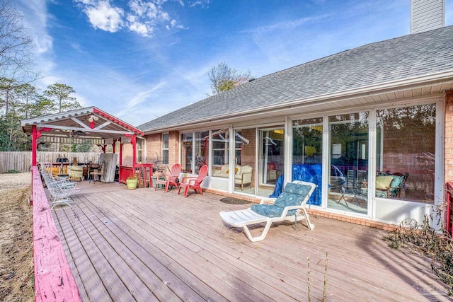 wooden deck featuring a gazebo