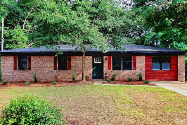 5197 Avenida Del Fuego, Pace, FL 32571 - ranch-style house with a front lawn