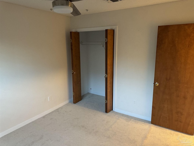 8156 Pompano St, Navarre, FL 32566 - unfurnished bedroom with baseboards, visible vents, light carpet, and a closet