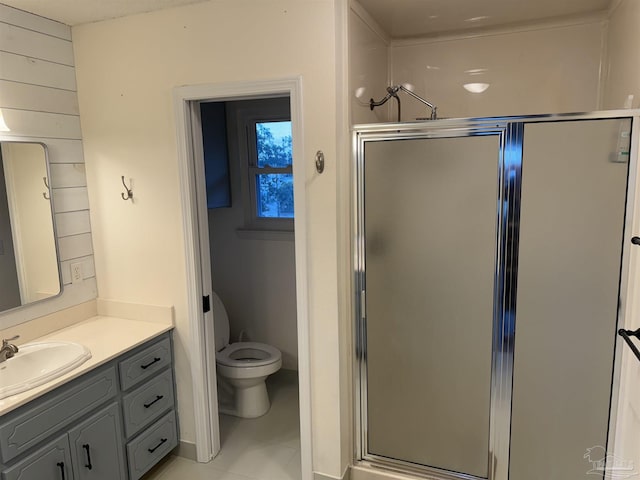 8156 Pompano St, Navarre, FL 32566 - full bath featuring vanity, tile patterned floors, toilet, and a shower stall