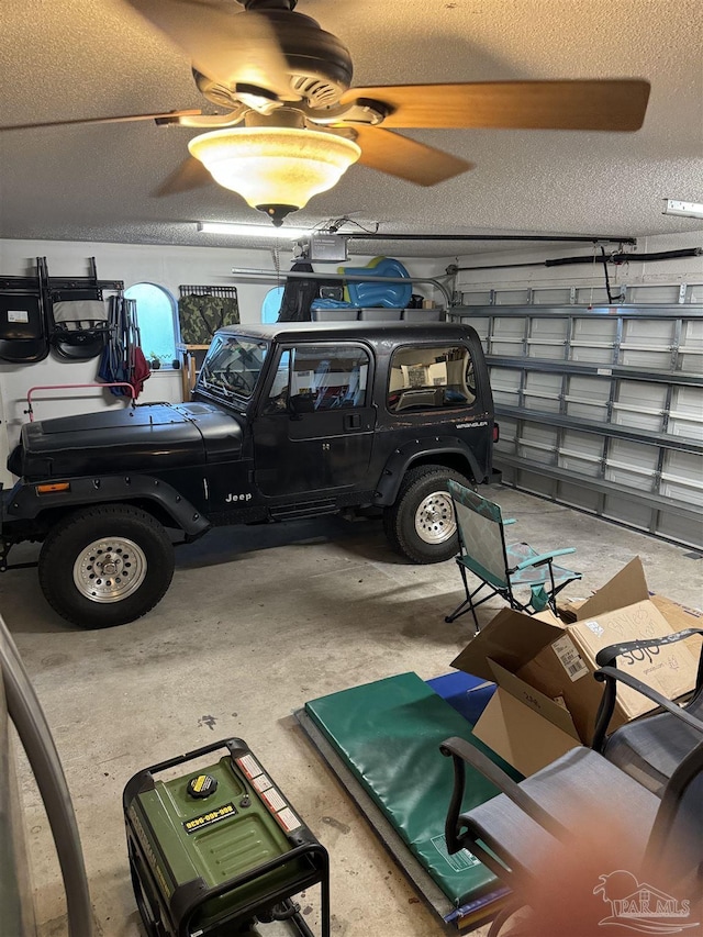 8156 Pompano St, Navarre, FL 32566 - garage with a ceiling fan