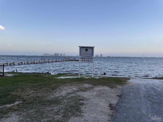 8156 Pompano St, Navarre, FL 32566 - view of water feature with a boat dock