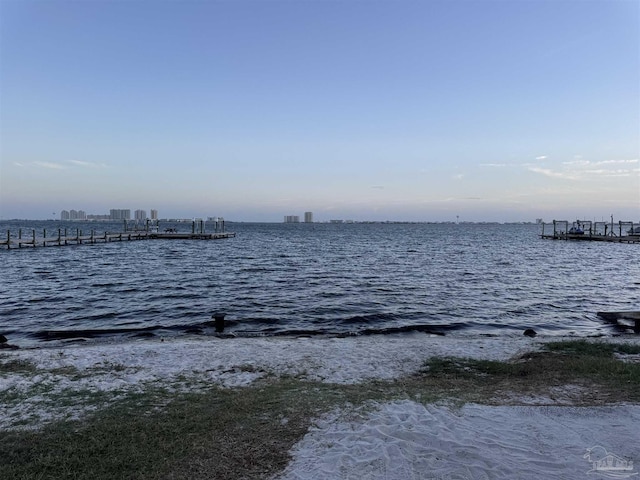 8156 Pompano St, Navarre, FL 32566 - property view of water with a dock