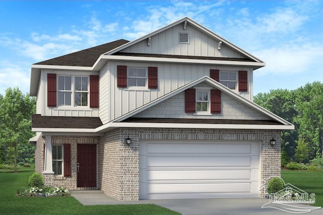 view of front of home with a garage and a front yard