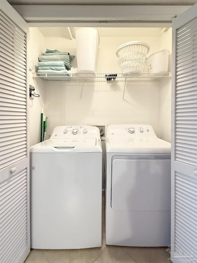 laundry area featuring washer and dryer and laundry area