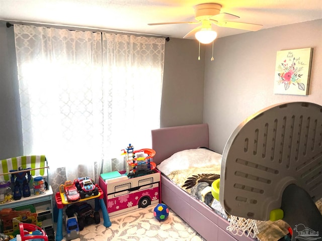 bedroom featuring ceiling fan