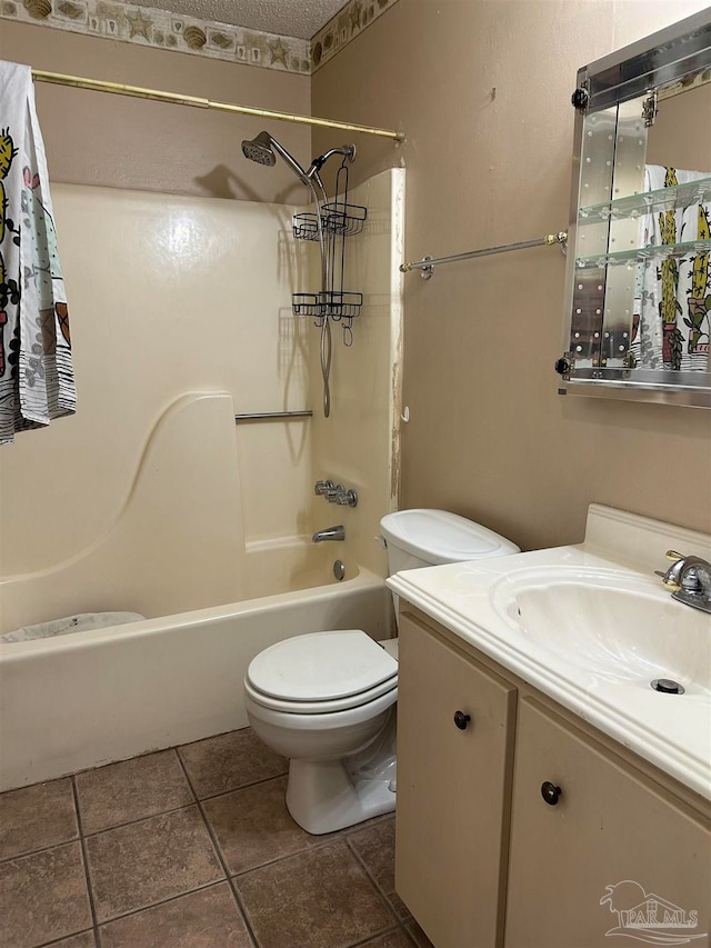 full bathroom featuring shower / tub combination, vanity, toilet, and tile patterned floors