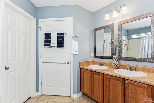 5397 Fawn Ridge Dr, Gulf Breeze, FL 32563 - bathroom with double vanity, tile patterned floors, and a shower with curtain