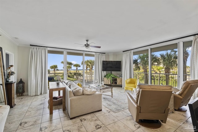 800 Ft Pickens Rd Unit 104, Pensacola Beach, FL 32561 - living room featuring plenty of natural light, crown molding, ceiling fan, and expansive windows