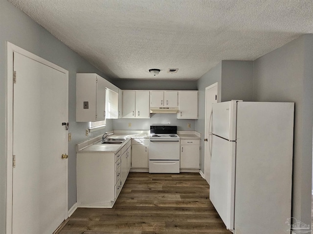 kitchen featuring white cabinetry, sink, white appliances, and dark hardwood / wood-style flooring