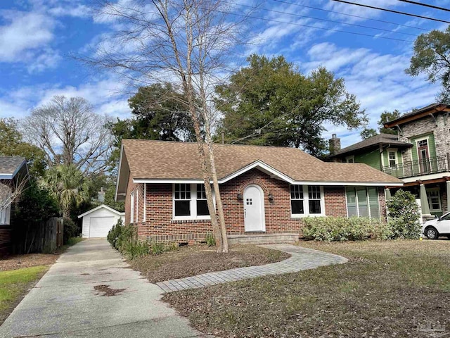 view of front of house with an outbuilding and a garage