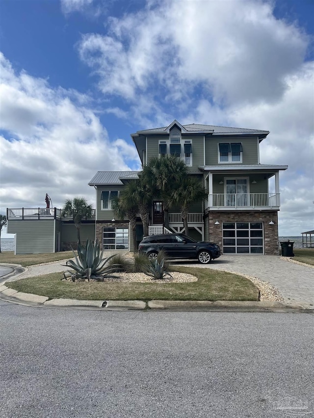 5350 Pale Moon Dr, Pensacola, FL 32507 - view of front facade featuring decorative driveway and a garage