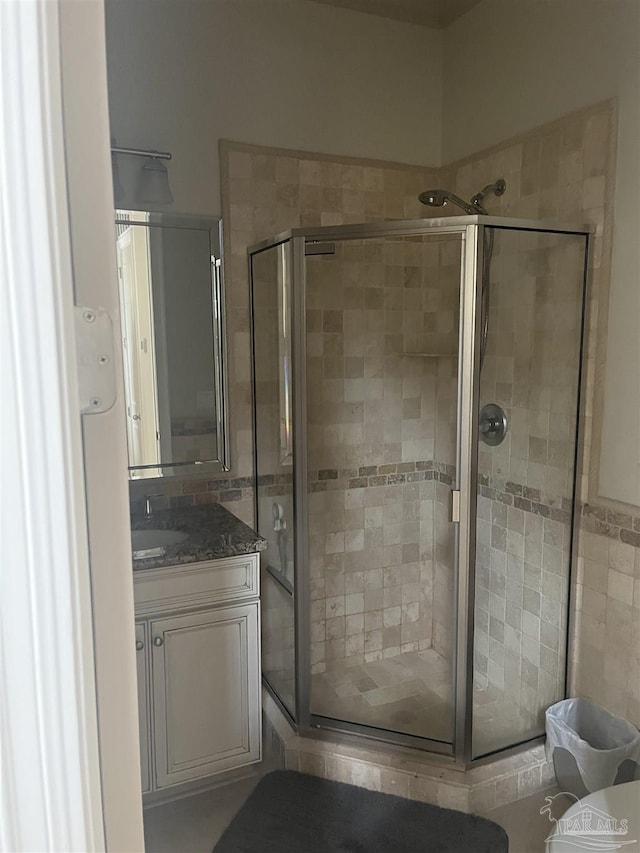 5350 Pale Moon Dr, Pensacola, FL 32507 - full bathroom featuring vanity and a stall shower