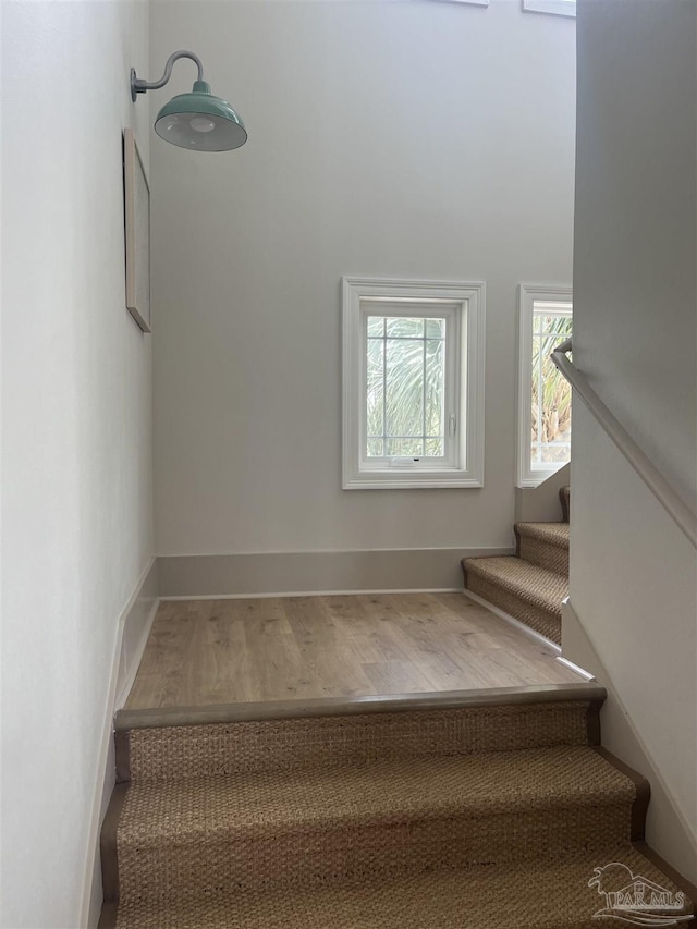 5350 Pale Moon Dr, Pensacola, FL 32507 - stairs featuring baseboards and wood finished floors