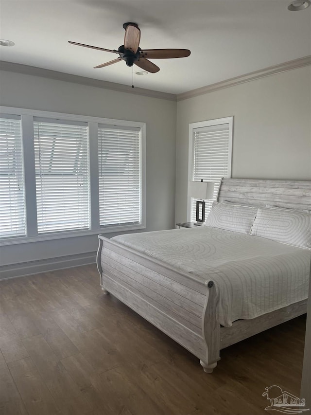 5350 Pale Moon Dr, Pensacola, FL 32507 - bedroom with ceiling fan, baseboards, dark wood-style flooring, and crown molding