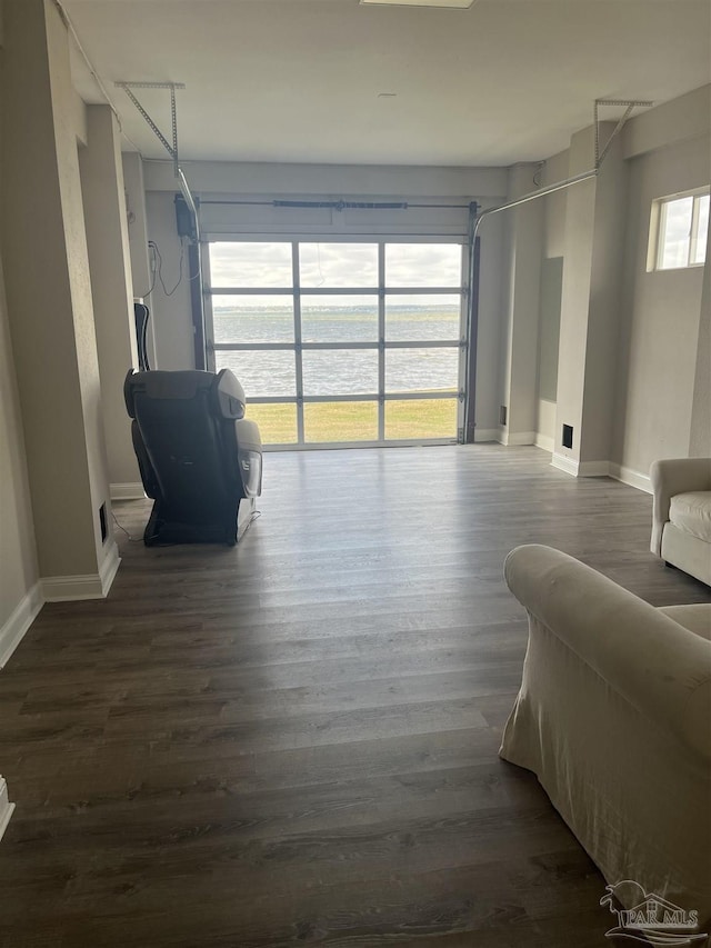 5350 Pale Moon Dr, Pensacola, FL 32507 - living area with dark wood-style floors and baseboards