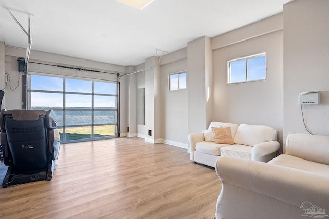 5350 Pale Moon Dr, Pensacola, FL 32507 - living room featuring baseboards and wood finished floors