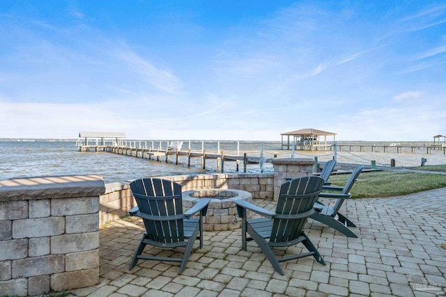 5350 Pale Moon Dr, Pensacola, FL 32507 - view of patio / terrace with an outdoor fire pit and a water view