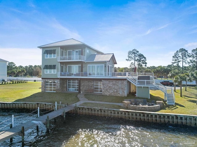 5350 Pale Moon Dr, Pensacola, FL 32507 - back of property with stairway, a balcony, stone siding, and a water view
