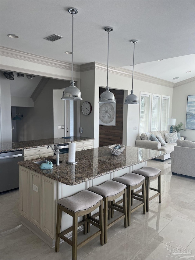 5350 Pale Moon Dr, Pensacola, FL 32507 - kitchen with visible vents, ornamental molding, a sink, dishwasher, and a kitchen breakfast bar