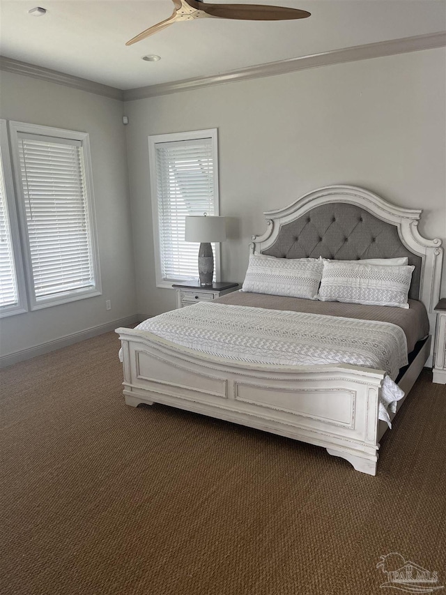 5350 Pale Moon Dr, Pensacola, FL 32507 - bedroom with crown molding, a ceiling fan, baseboards, and dark carpet