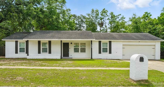 4248 Seaport Rd, Pace, FL 32571 - ranch-style house featuring brick siding, an attached garage, driveway, a porch, and a front lawn