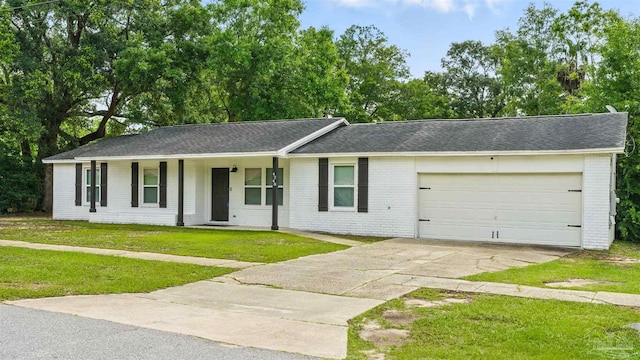 4248 Seaport Rd, Pace, FL 32571 - ranch-style home with brick siding, a garage, concrete driveway, a porch, and a front yard